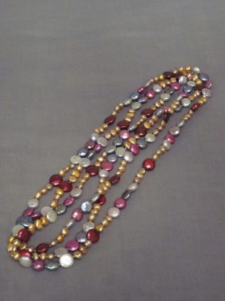 A rope of multi coloured cultured pearls