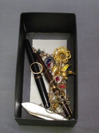 A silver bladed fruit knife with mother of pearl grip and a small collection of costume jewellery