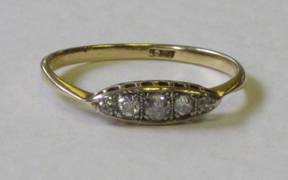 A lady's 18ct yellow gold dress ring set 5 stones