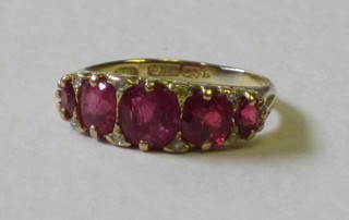 An 18ct gold dress ring set 5 rubies