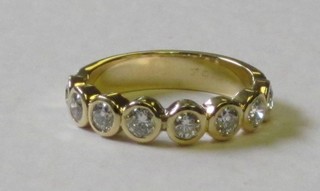 An 18ct yellow gold half eternity ring set diamonds, approx 1ct