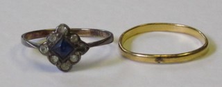 A 22ct gold wedding band and a dress ring set blue and white stones