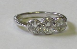 A lady's 18ct white gold engagement/dress ring set 3 diamonds, approx 1.50ct