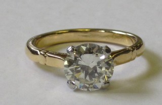 A lady's 18ct yellow gold engagement/dress ring set a circular cut solitaire diamond approx 1.90ct