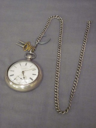 A silver pair cased pocket watch with enamelled dial by Stewart of Liverpool contained in a silver pair case, hung on a silver chain