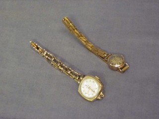 A lady's Tudor wristwatch contained in a gold case and 1 other