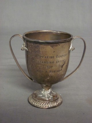 A Victorian silver twin handled trophy cup, London 1867, (crudely repaired to base)