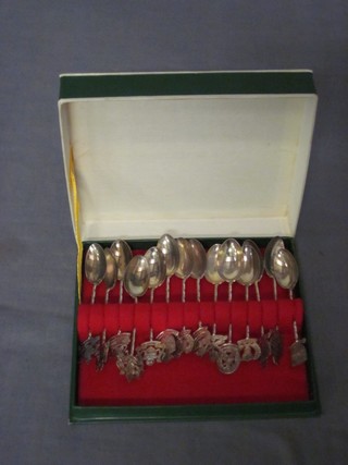 A set of 14 various Eastern silver spoons decorated crests
