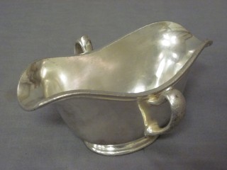 An American silver plated double spouted sauce boat decorated an eagle and 13 stars by R Wallace USA