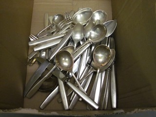 A collection of silver plated flatware
