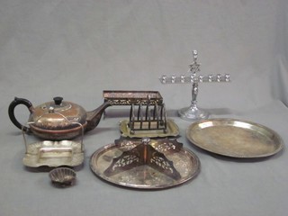 A silver plated teapot, 2 circular silver plated salvers and a small collection of silver plated items