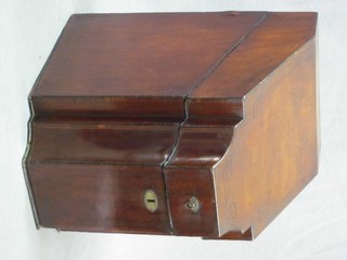 A 19th Century shaped mahogany knife box with hinged lid and fitted interior 10"