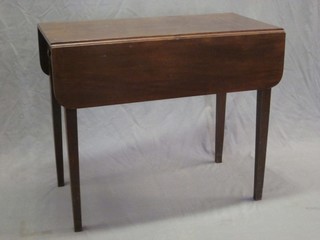 A 19th Century mahogany Pembroke table fitted a frieze drawer and raised on square tapering supports 33"