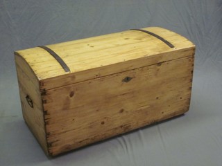 A Continental stripped and polished pine dome trunk with iron hinges and drop handles 38"