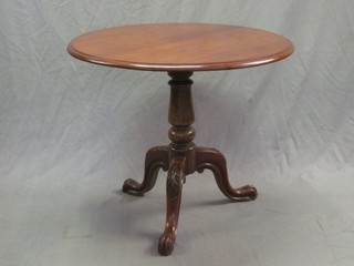 A 19th Century mahogany circular snap top tea table, raised on pillar and tripod supports 34"