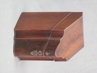 A Hepplewhite style mahogany knife box of serpentine outline with hinged 8"