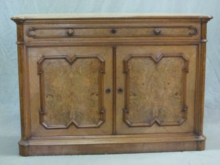 A handsome 19th Century French burr walnut side cabinet fitted 1 long drawer above a double cupboard, 48"