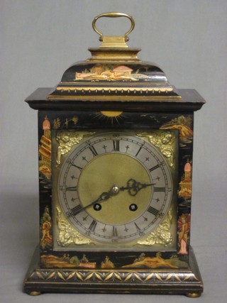 An Astral bracket clock with silvered dial and Roman numerals contained in a black lacquered chinoiserie style case 8"