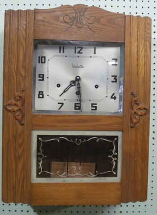An Art Deco French chiming wall clock with silvered dial and Arabic numerals, the dial marked Vedette contained in an oak case