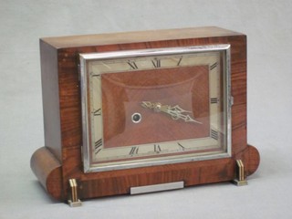 An Art Deco 8 day striking mantel clock with square dial and Roman numerals contained in a walnut case 10"