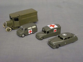 A Dinky model Hudson Sedan staff car, a Dinky Military Daimler Ambulance, a Corgi model Bedford Ambulance and a pressed metal model of an army lorry