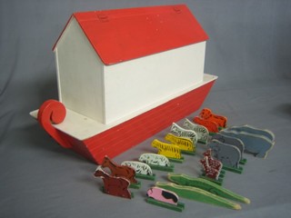 A modern wooden model of Noah's Ark 25" containing 19 various wooden figures