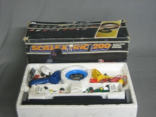 A Scalextrix 200 racing car game, boxed