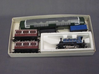 A Lima double headed diesel locomotive, a Hornby tank engine and 4 items of rolling stock