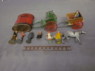 A pressed metal model of a pillar box, 2 Britons traps and various Britons figures