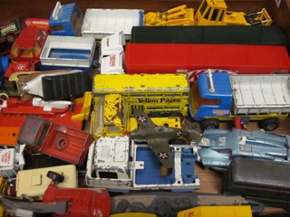 A collection of model trucks, lorries, a hovercraft, etc