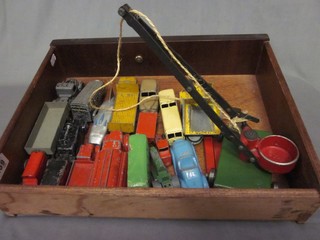 A metal model crane, a Dinky Meccano metal model racing car and a collection of other models