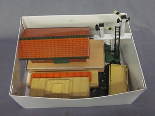 A Hornby OO platform and station, a pressed  metal model Goods Department and a Hornby turn table
