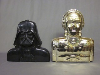 A Darth Veda carry case containing 33 original Star Wars figures, a C3PO carry case containing 41 original  Star Wars figures including a frozen Han Solo and a box of weapons