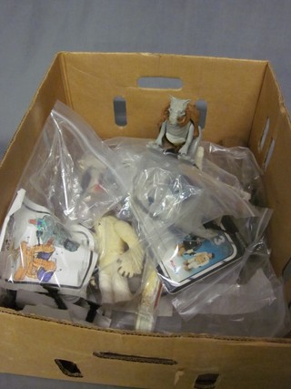 A collection of Empire Strikes Back figures including X-wing fighter with instructions, Taun Taun, PDT-8 with instructions, MCL-3 with instructions, MTV-7 with instructions (drawn on) and a Hoth Wompa with instructions