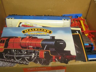A large gauge plastic train set comprising double headed diesel, 2 carriages and various pamphlets/catalogues