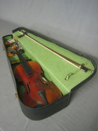 A violin with 2 piece back, labelled Lowendal 1889, Dresden 14" (some damage) complete with bow, contained in a carrying case