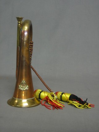 A reproduction copper and brass bugle
