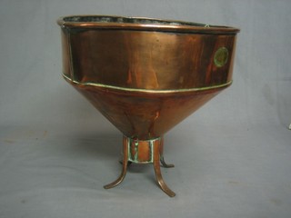 A large copper funnel 13"
