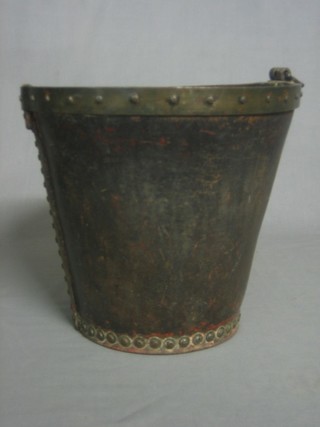 A 19th Century leather and brass cavalry feed bucket 10"
