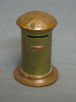A copper and brass money box in the form of a pillar box 4 1/2"