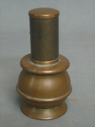 A copper table lighter of club form 7"