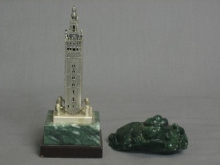 A green hardstone figure in the form of an Eastern mythical beast 3" and a metal model of a Venetian bell tower 5"