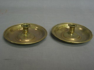 A pair of 19th Century circular brass chamber candlesticks 6"