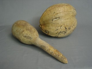 A large wooden nut and 1 other