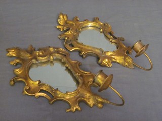 A pair of gilt plaster wall brackets with candle sconces 11"
