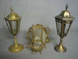 An octagonal gilt metal lantern and 2 similar table lamps