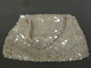 A lady's bead work evening bag