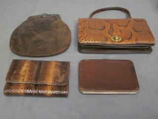 A lady's snake skin handbag, a do. purse, a leather purse by Drew & Sons and a purse with white metal mounts
