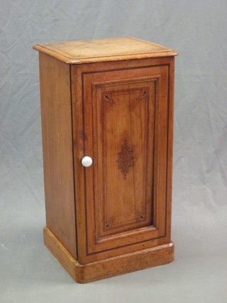 A Victorian painted pine pot cupboard enclosed by a panelled door 16"