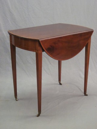 A 19th Century oval inlaid mahogany Pembroke table fitted a drawer and raised on square tapering supports 29"